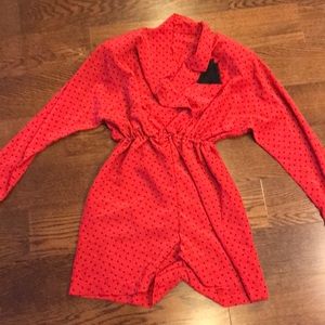Red with black polka dot romper